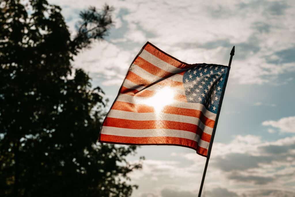 American Flag Under a Cloudy Sky